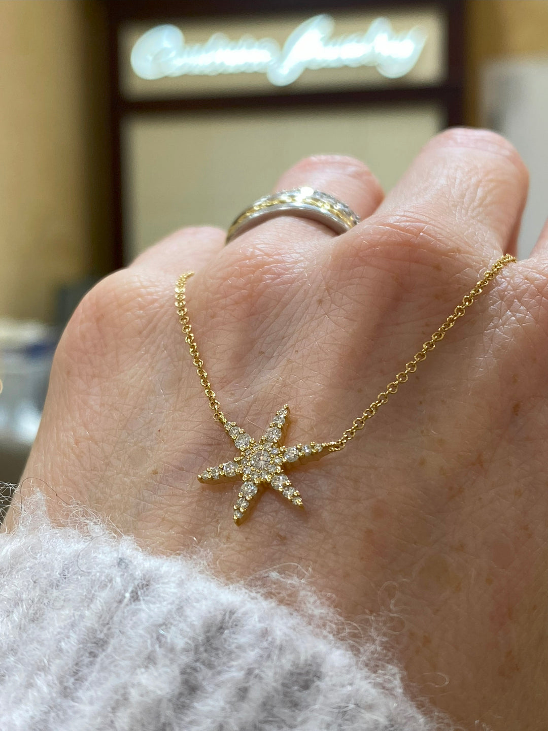 Gold Starburst Pendant Necklace