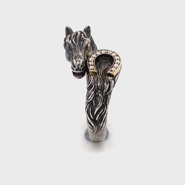 Unique equestrian statement ring with natural diamond horseshoe accent