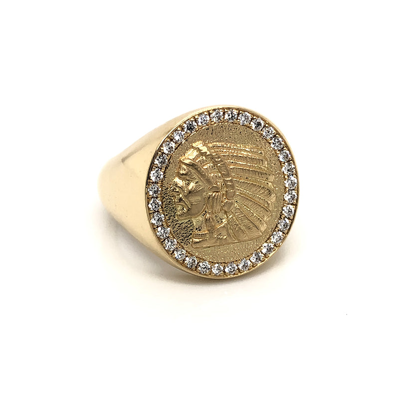 18K yellow gold statement ring featuring an Indian head motif surrounded by a round diamond halo
