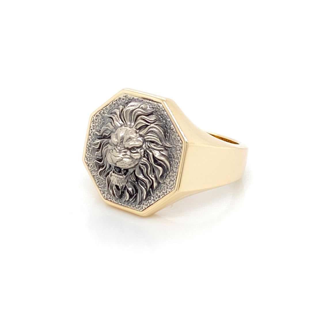 Two-tone 14K gold lion signet ring with black oxidized white gold lion face