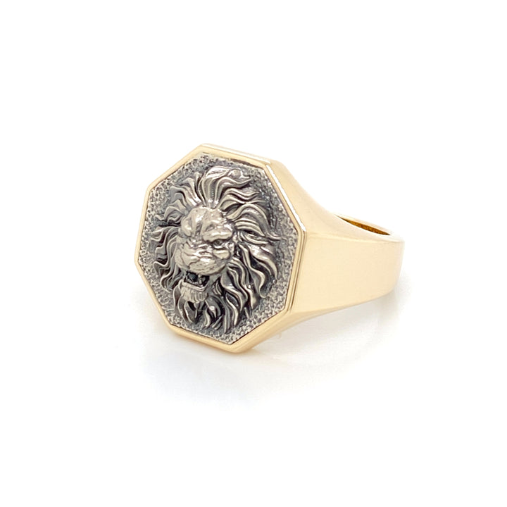 Two-tone 14K gold lion signet ring with black oxidized white gold lion face