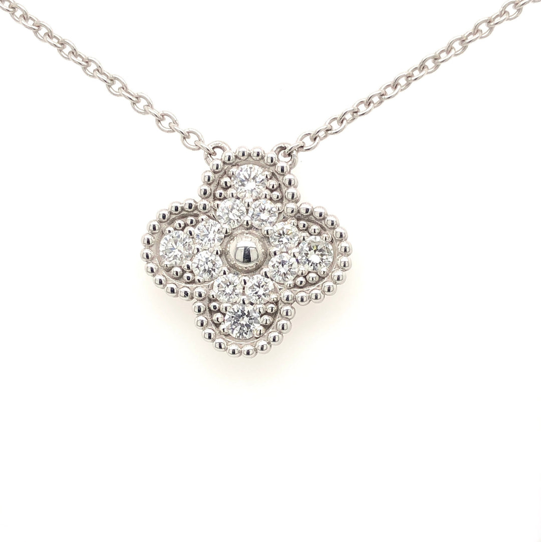 18K White Gold Diamond necklace with a clover-shaped pendant featuring a cluster of small, round diamonds.