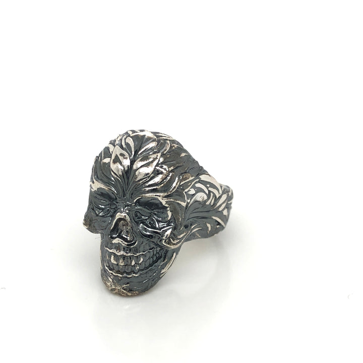 Front view of polished and oxidized sterling silver statement ring