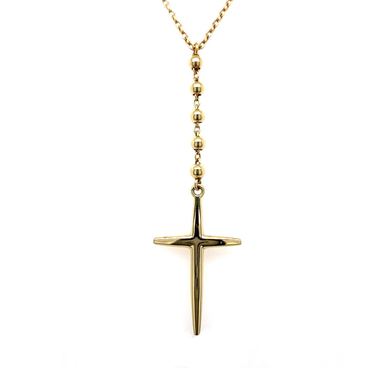 A 14k yellow gold rosary featuring bead links and a cross pendant, with an adjustable cable chain.